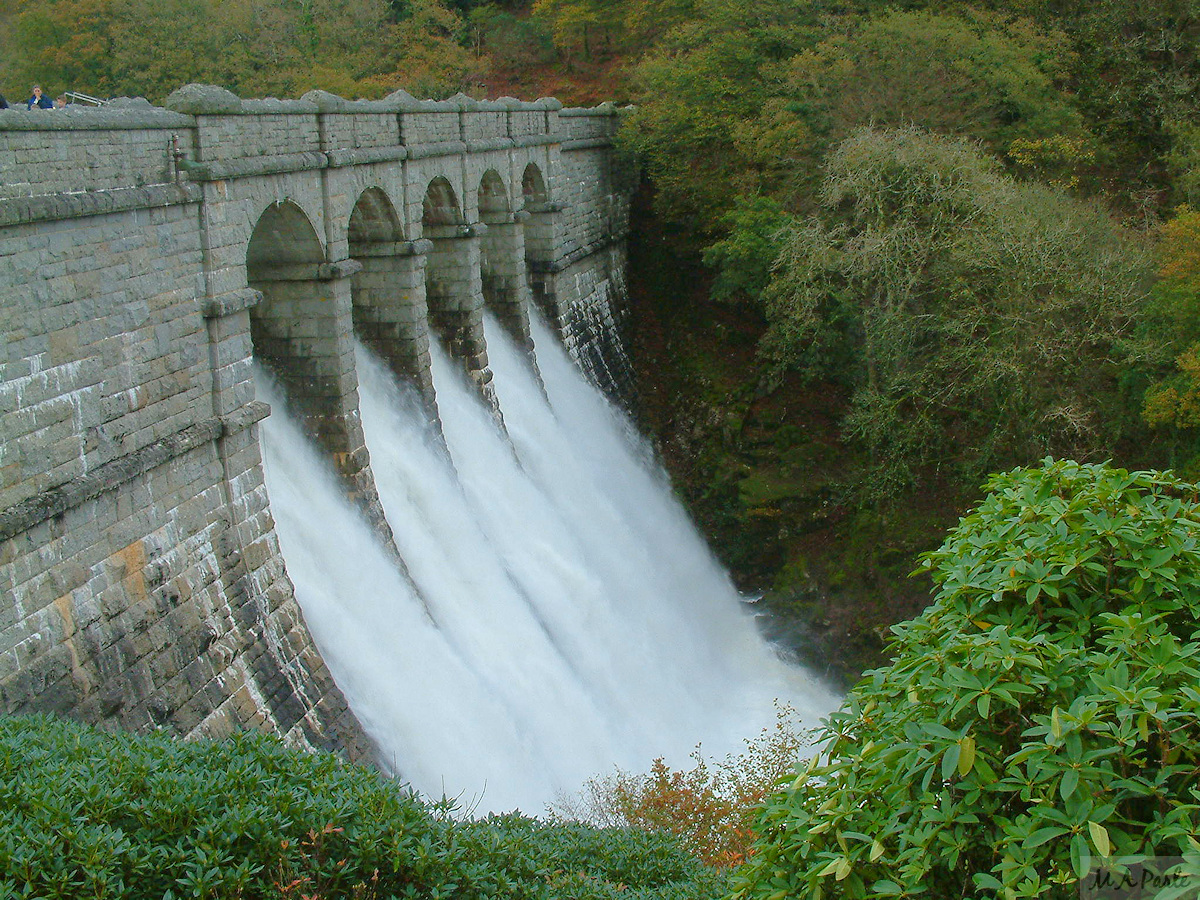 Water cascades over the Burrator Dam wall